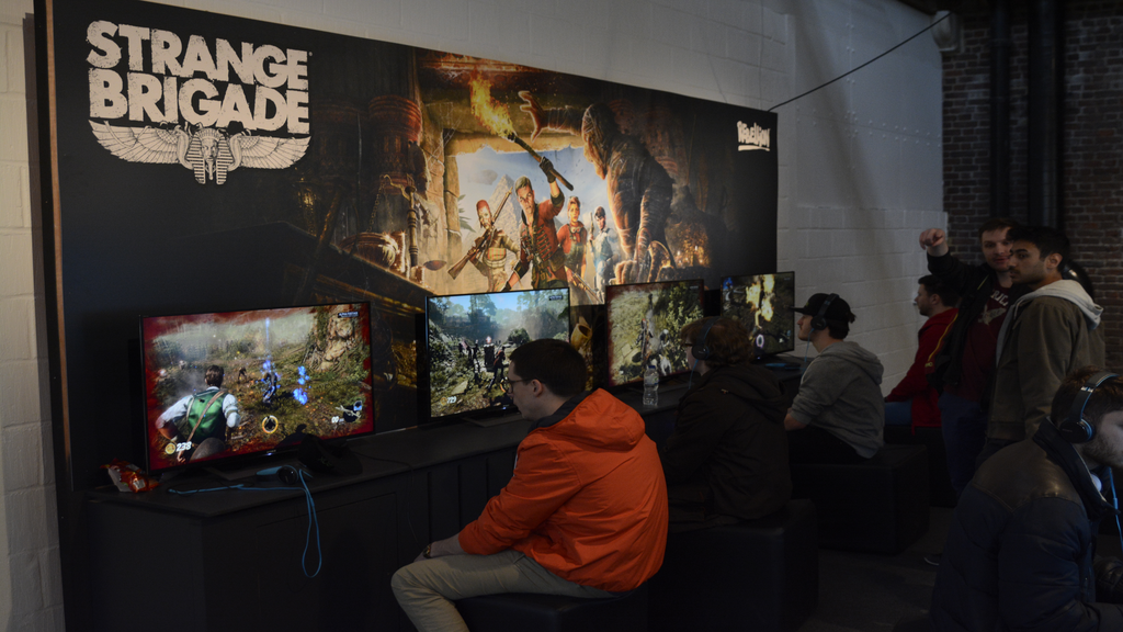 Attendees at the Strange Brigade EGX Rezzed 2018 booth - Pass the Controller